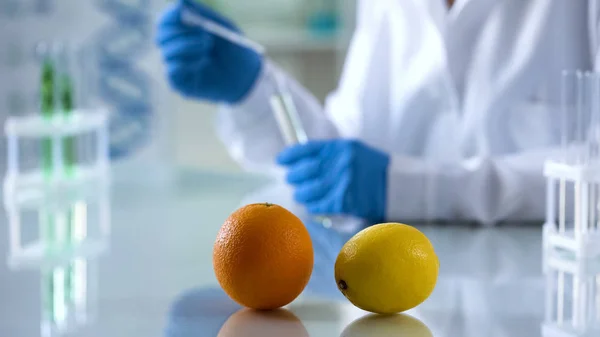 About depositphotos_226452972-stock-photo-citrus-fruits-lab-table-scientist